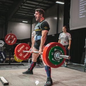 powerlifting trainer man lifting bar